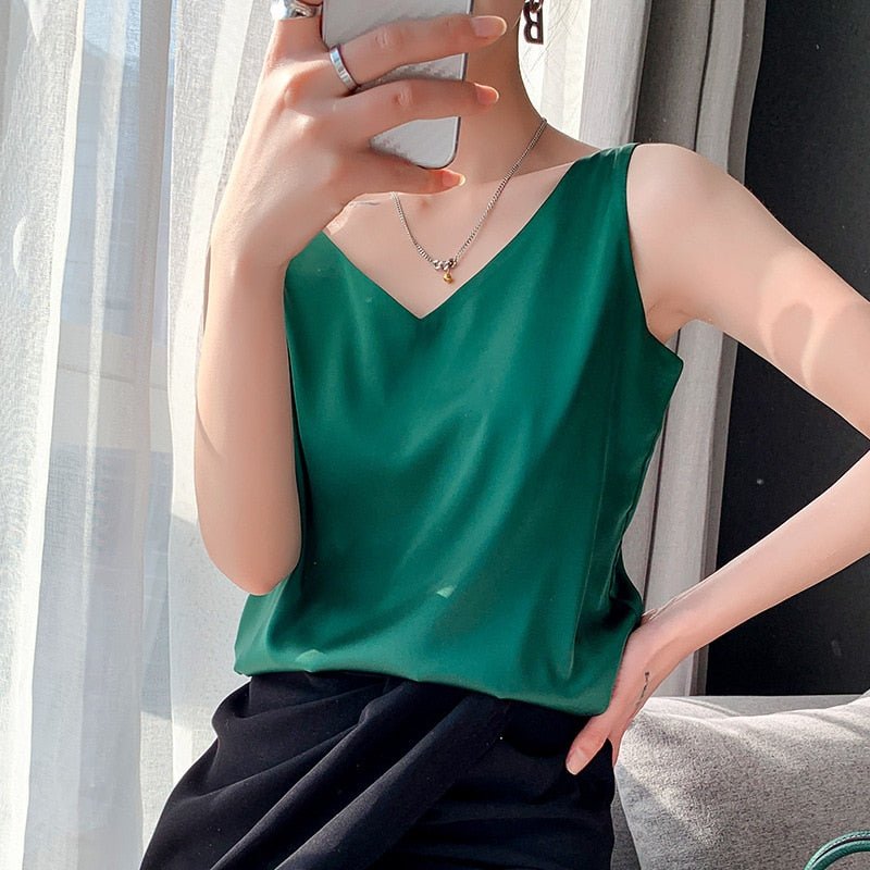 Relaxed fit women's sleeveless tank top; a versatile blouse for casual or dressy occasions.