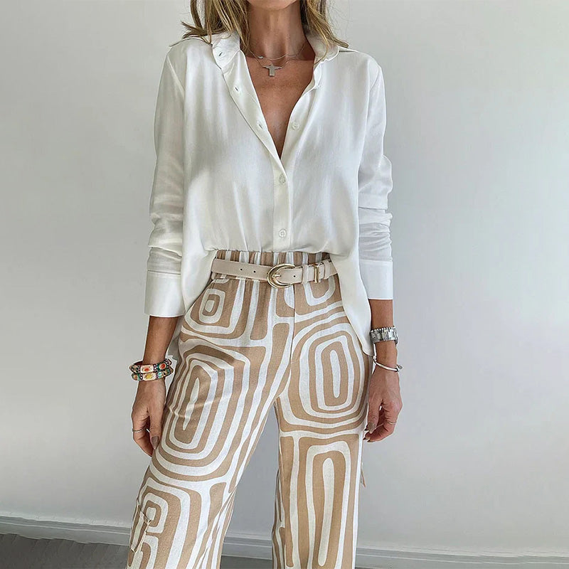 Detail shot of the flowing top from a women's elegant matching set, emphasizing its soft fabric and design.