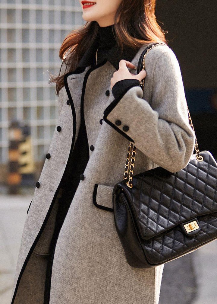 Sophisticated women's tailored grey coat, long sleeve, ideal for elegant winter fashion, classic & versatile outerwear.
