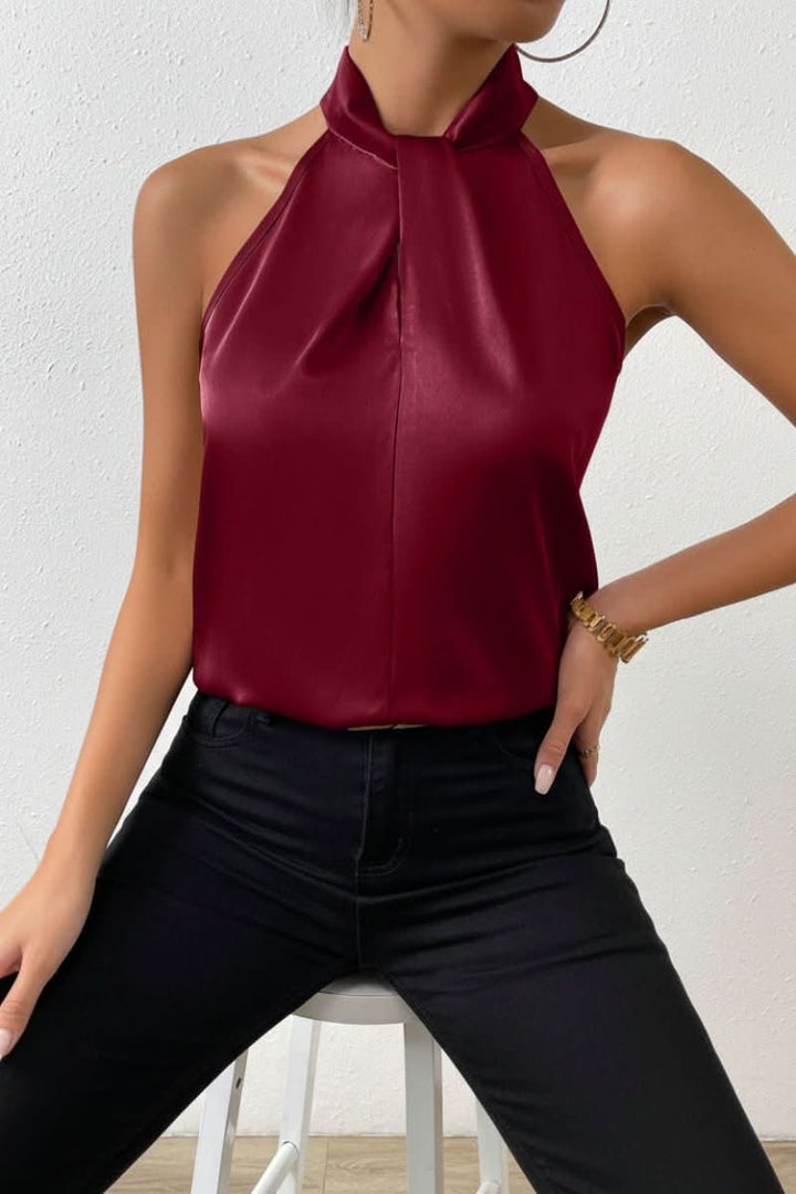 Versatile women's halter knot blouse, a modern sleeveless top perfect for casual chic or professional settings.