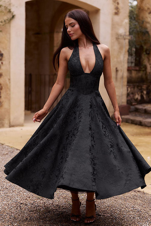 Women's stunning halterneck maxi dress, a classic evening gown.