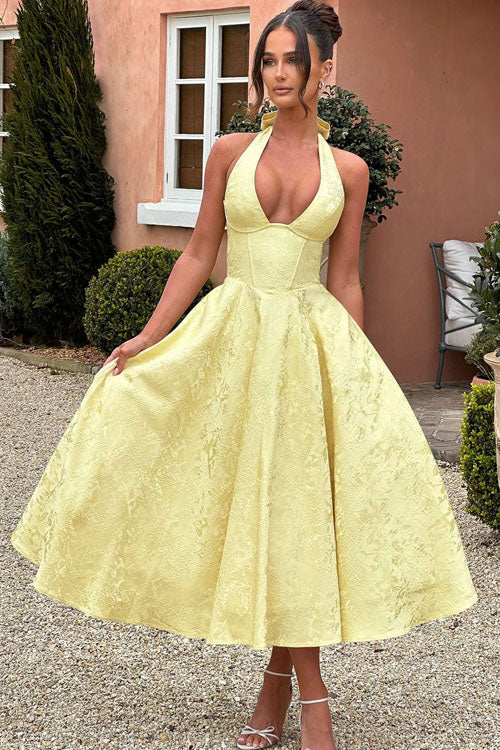Sophisticated A-line halterneck maxi gown, perfect for prom night.