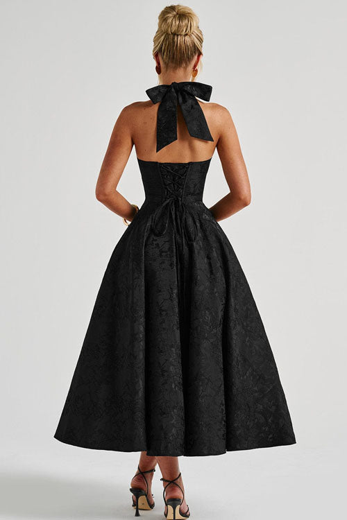 Elegant women's halterneck maxi gown, ideal for formal dinners.