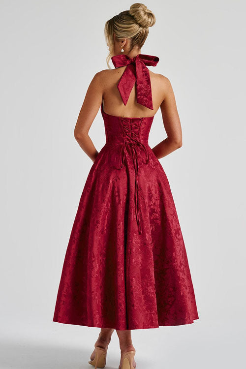 Chic halterneck maxi party dress, a stylish choice for women.