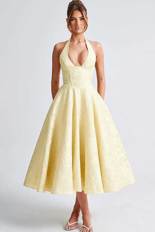 Long elegant halterneck maxi dress, versatile for many events.
