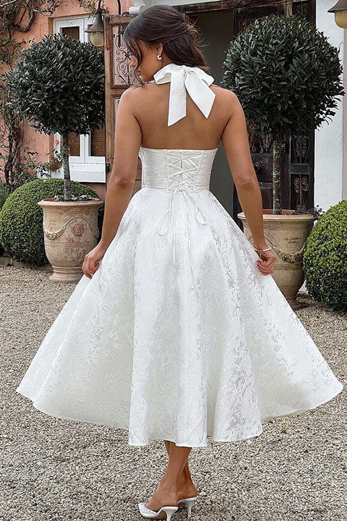Beautiful women's halterneck maxi dress, an ideal prom or homecoming look.