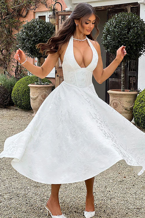 Formal A-line halterneck maxi dress, for sophisticated women's events.