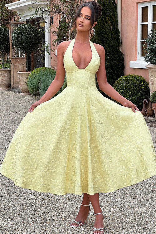 Stunning halterneck maxi gown, perfect for red carpet events.