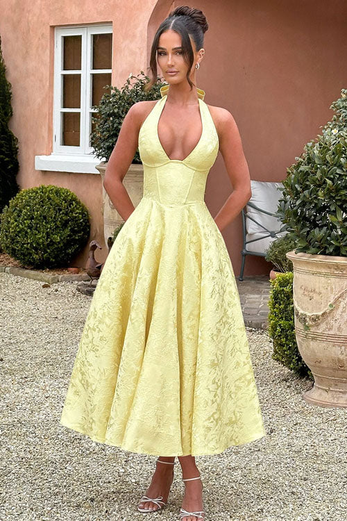 Chic A-line halterneck maxi dress for special occasion elegance.