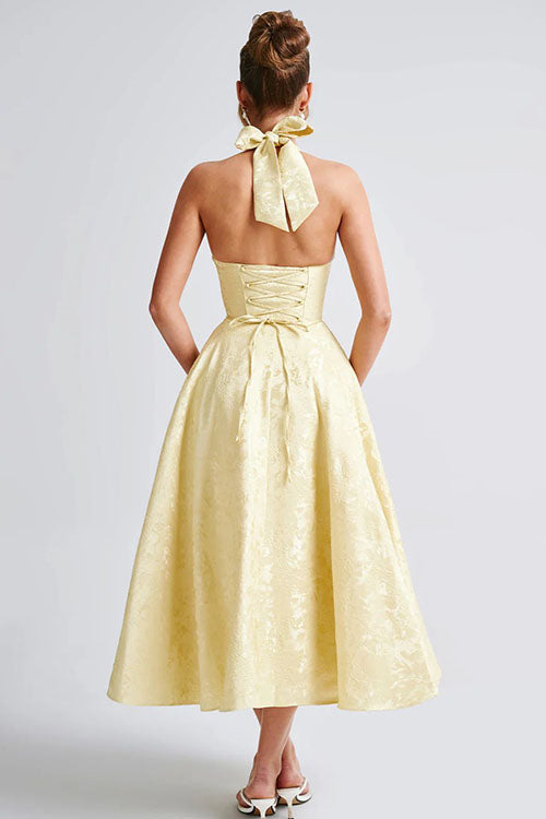 Women's formal halterneck maxi dress, sophisticated & stylish.