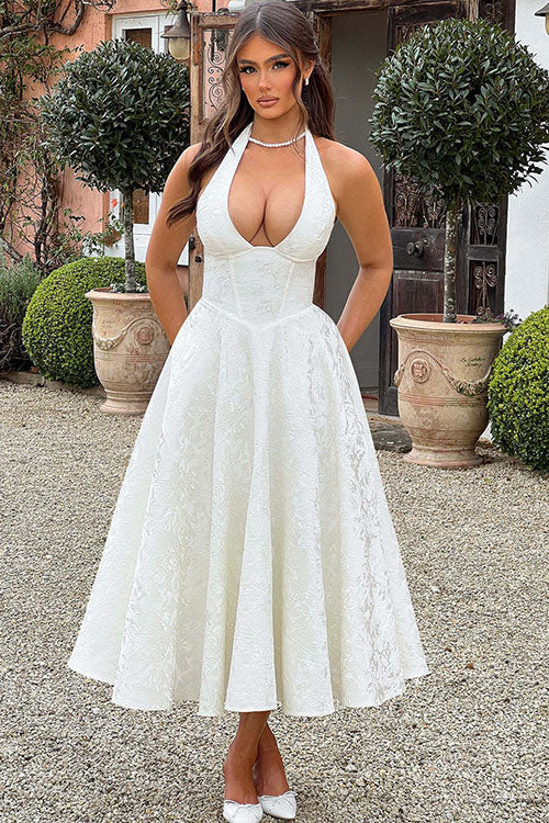 Long elegant women's halterneck maxi dress for glamorous evenings.