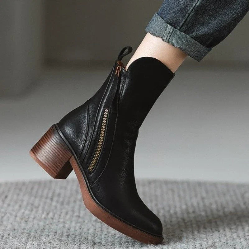 Sleek women's high heel ankle boots, zippered, for sophisticated evening parties, formal events & fashion.