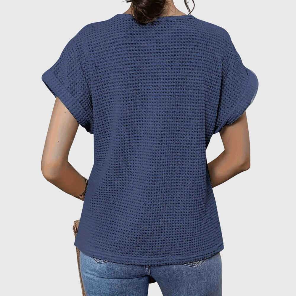 Versatile women's elegant blouse featuring beautiful lace, embodying relaxed Ibiza style.