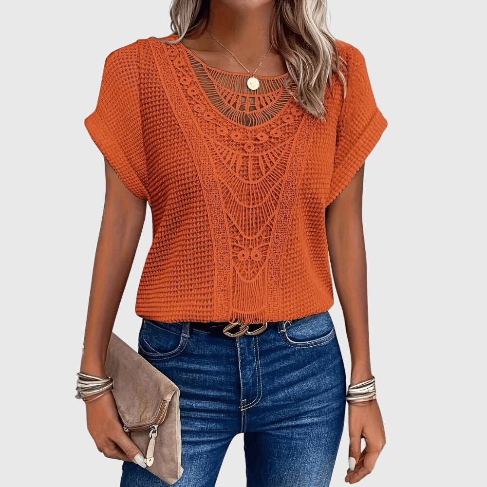 Summer-ready women's top, white, with lace details, capturing the essence of Ibiza bohemian style.