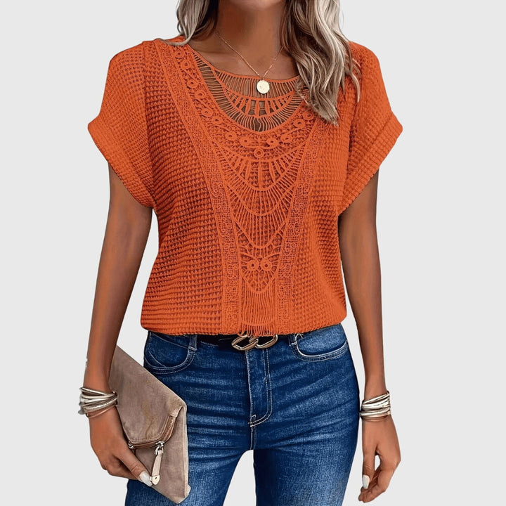 Summer-ready women's top, white, with lace details, capturing the essence of Ibiza bohemian style.