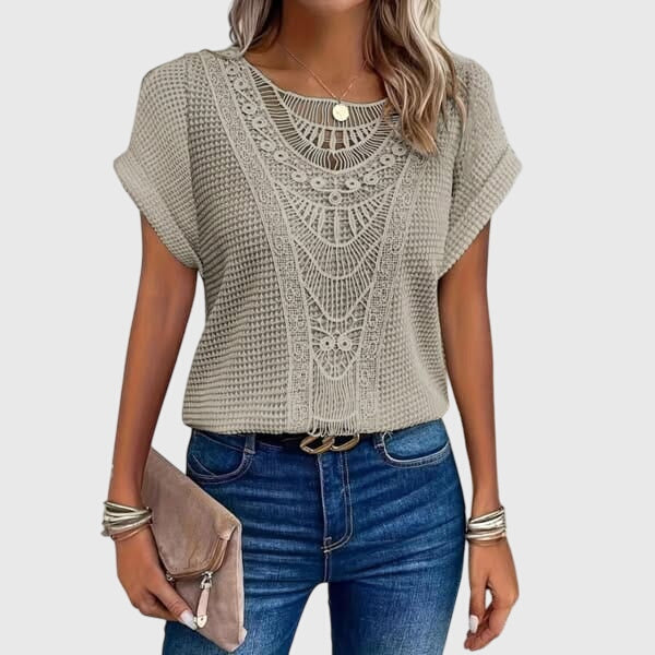 Bohemian women's blouse with intricate lace, an elegant and versatile Ibiza style summer top.