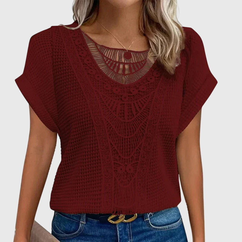 Elegant white lace blouse for women, embodying the relaxed, chic Ibiza style for summer.
