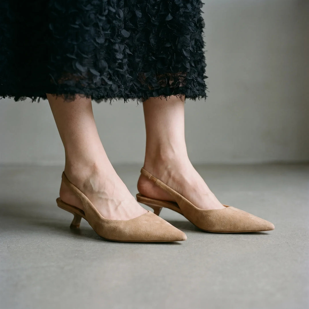 Women's elegant kitten heel slingback sandals, perfect for office wear or evening events.