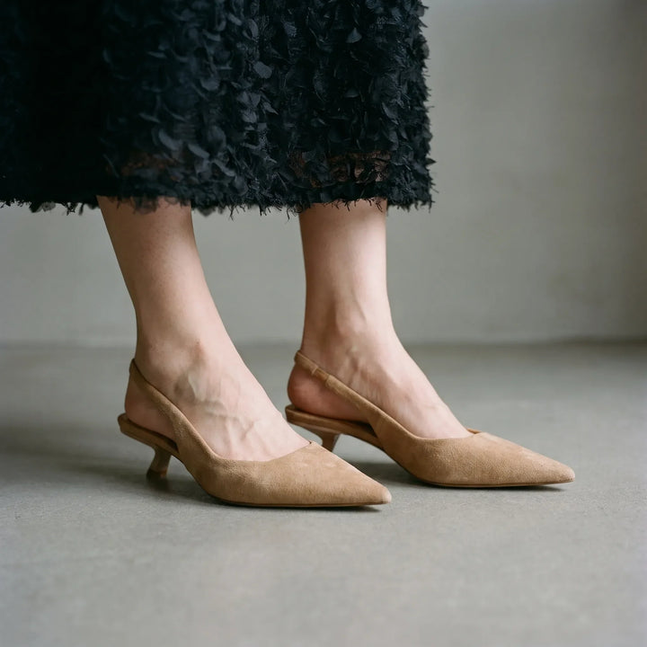 Women's elegant kitten heel slingback sandals, perfect for office wear or evening events.