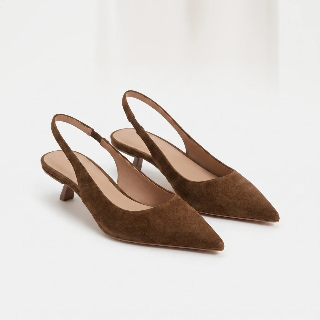 Classic women's slingback kitten heels with a sleek pointed toe, ideal for elegant style.