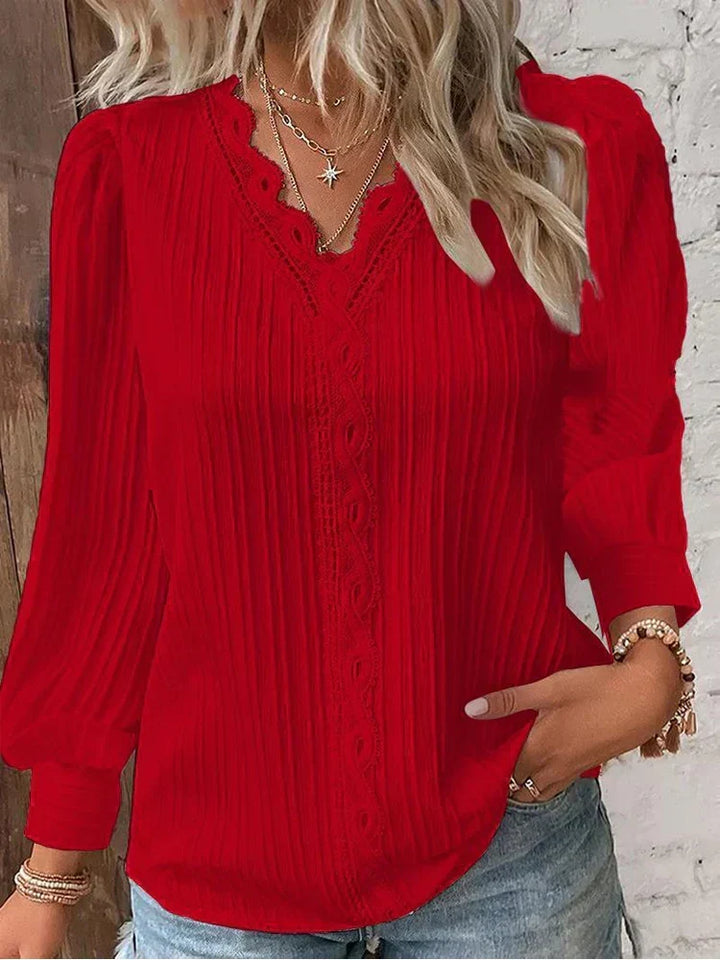 Chic white women's blouse with lace accents & puff sleeves, ideal for versatile spring fashion.