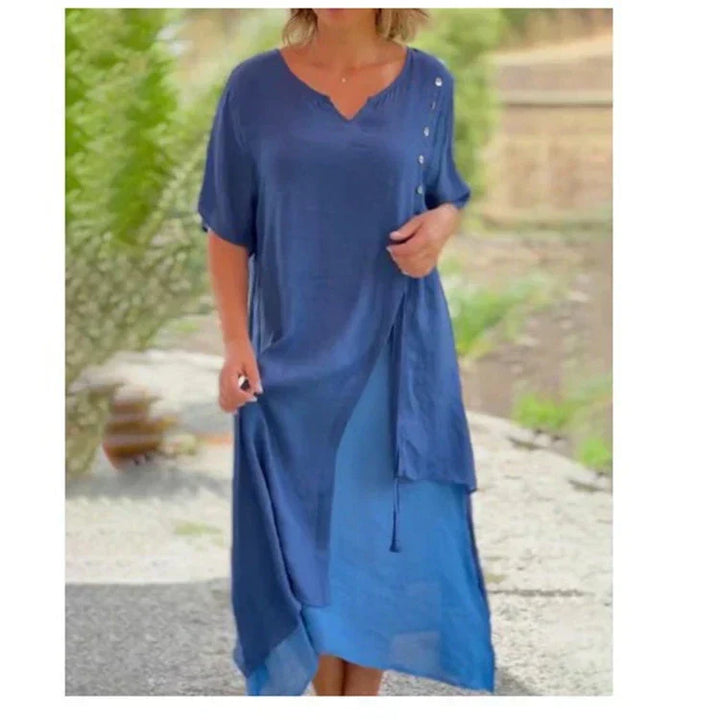 Casual & elegant women's layered midi dress with a V-neck and short sleeves. Ideal for warm weather fashion.