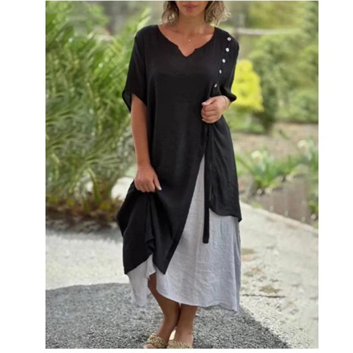 Relaxed fit women's layered midi dress with V-neck & short sleeves. A versatile summer dress for various occasions.