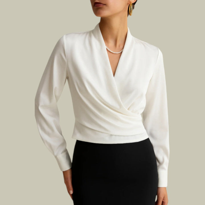Classic women's long-sleeve wrap blouse, offering an elegant and sophisticated look for professional or formal events.