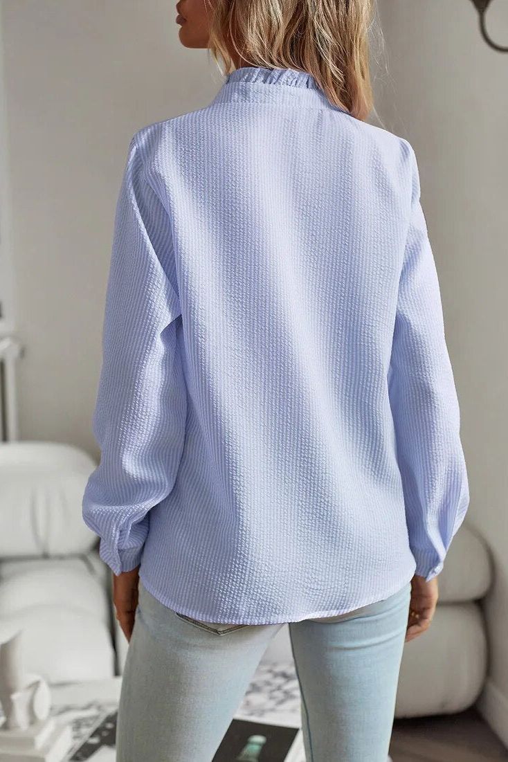 Sophisticated women's longsleeve blouse, ideal for office wear & professional work attire. Elegant & polished top.