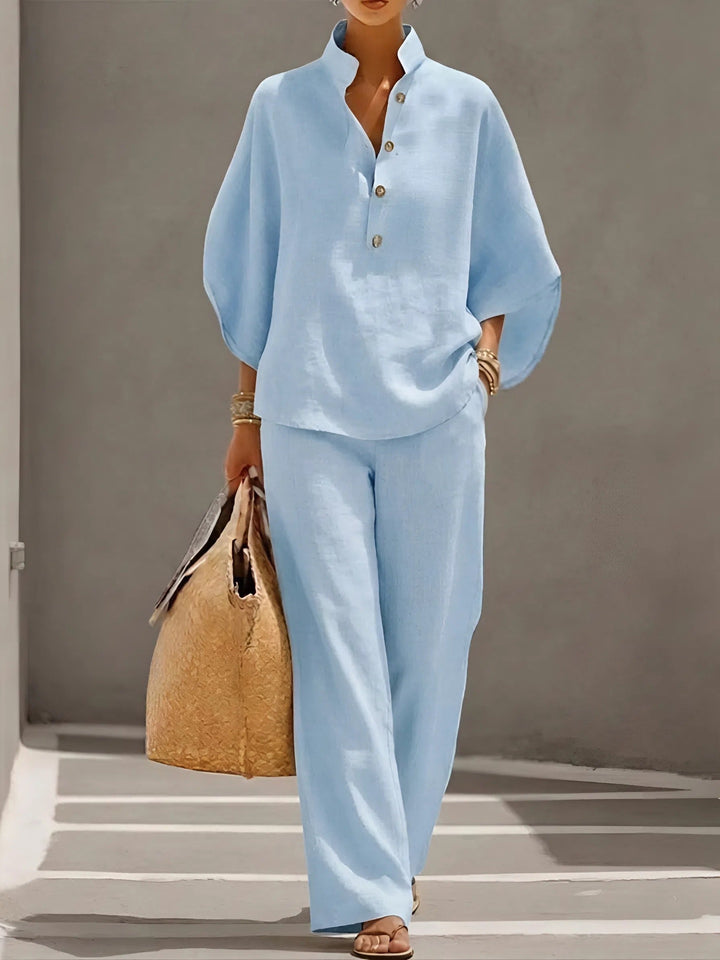 Mandarin collar top and wide-leg pants make this women's two-piece set an elegant summer outfit.