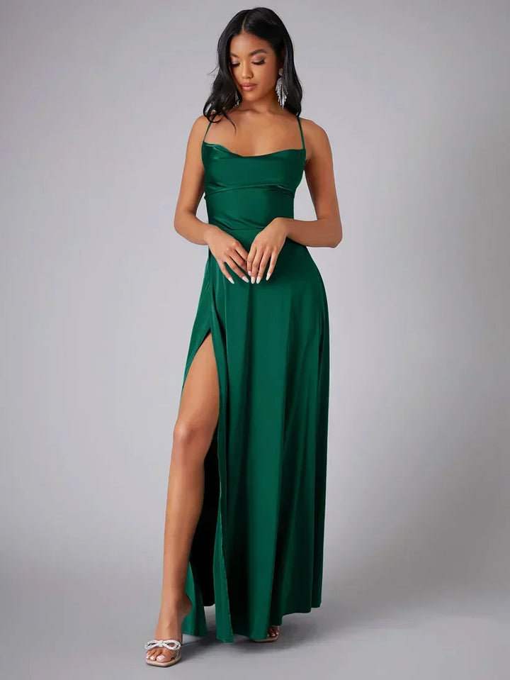 Chic women's special occasion maxi dress, perfect for formal events, with a dramatic high leg slit & open back.