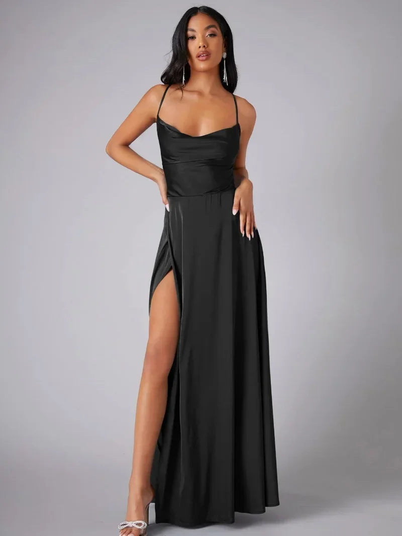 Stylish women's evening gown, ideal for parties, with a dramatic high slit, open back, & elegant maxi length.