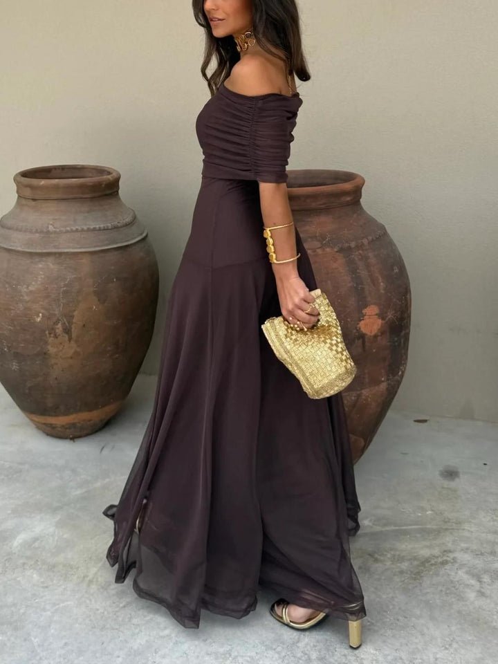 Elegant brown off-shoulder long dress, a stylish choice for formal events and evening wear.