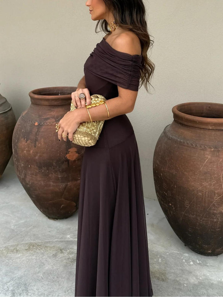 Stunning brown off-shoulder long dress for women, suitable for parties and elegant evening events.