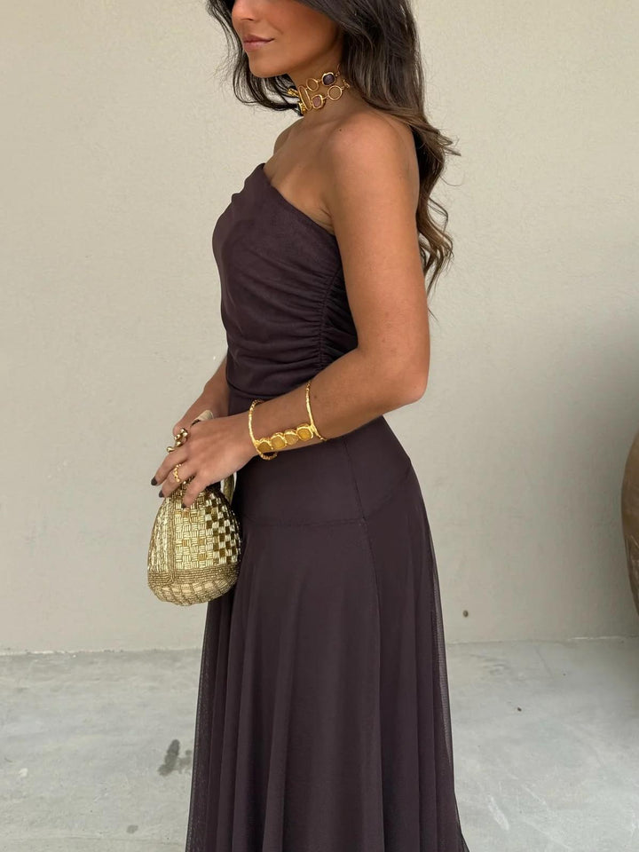 Sophisticated brown off-shoulder long maxi dress for women, offering an elegant and formal look.