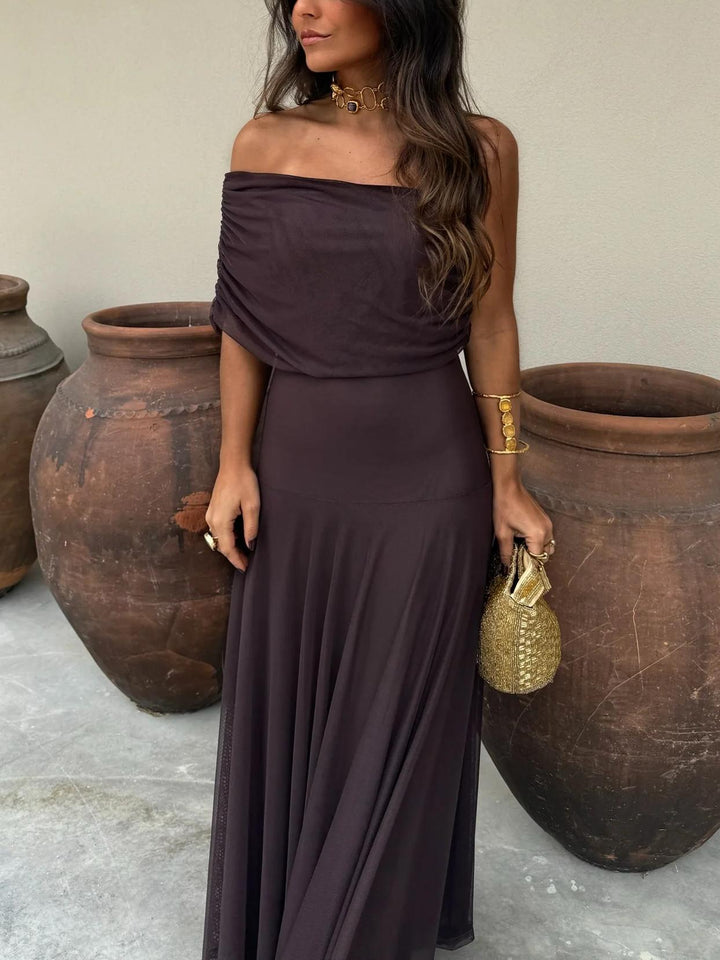 Luxurious flowing off-shoulder A-line maxi dress in brown, an elegant choice for women's formal wear.