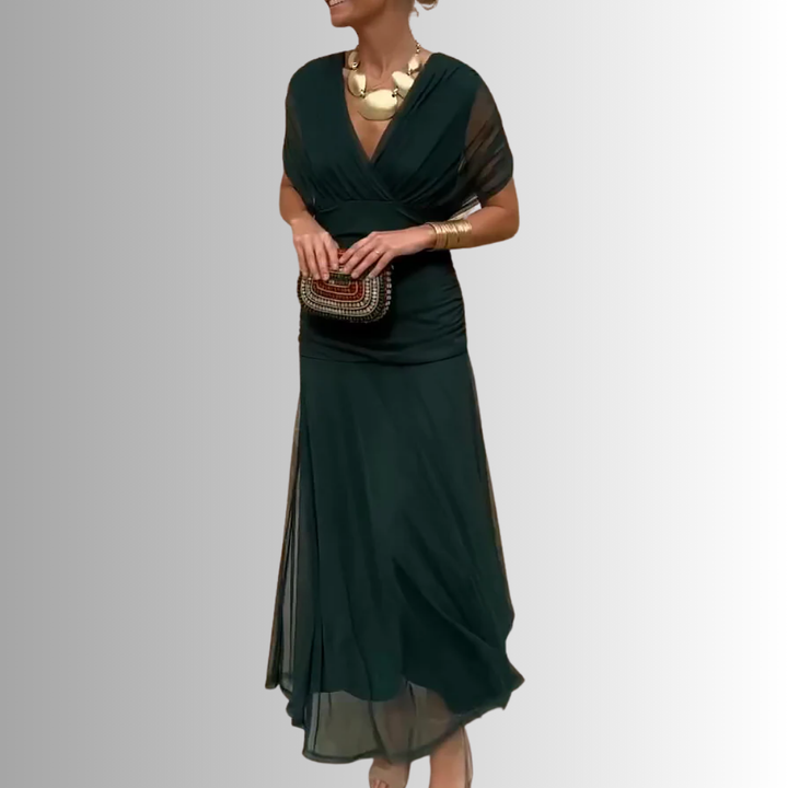 Sophisticated women's off-shoulder flowing maxi dress, an elegant choice for evening events & galas.
