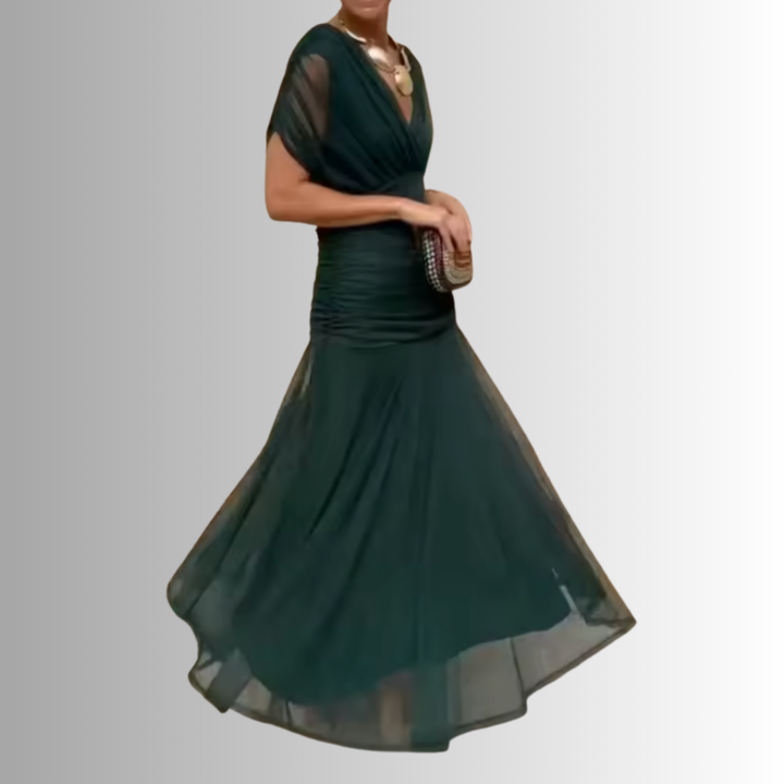 Stylish women's off-shoulder maxi dress, a flowing evening gown for formal parties & celebrations.