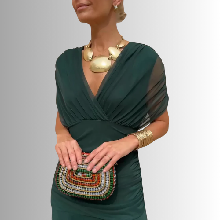 Elegant off-shoulder maxi dress for women, ideal as a party dress or wedding guest attire.