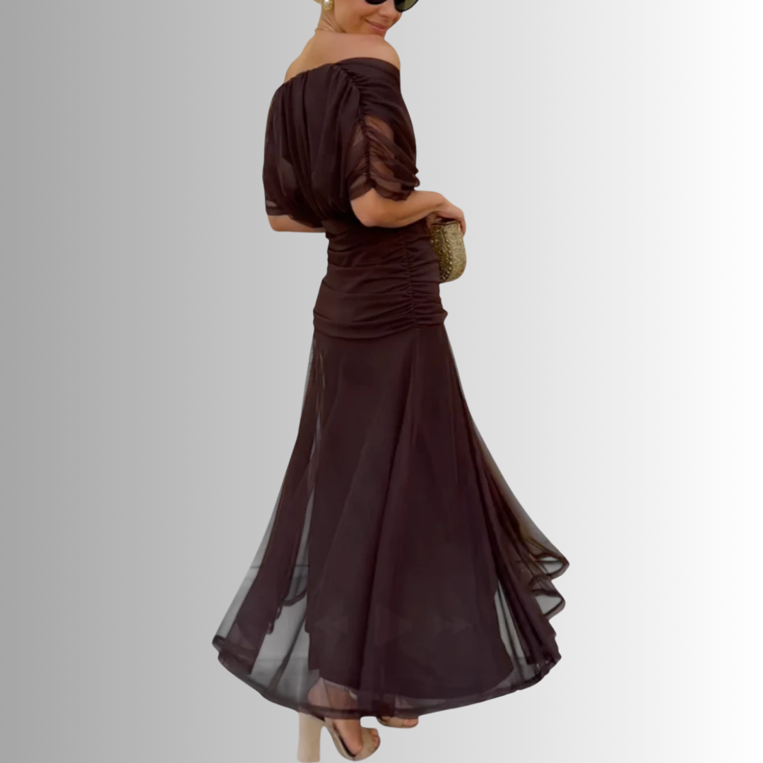 Beautiful off-shoulder flowing maxi dress for women, perfect for chic formal evening events & celebrations.