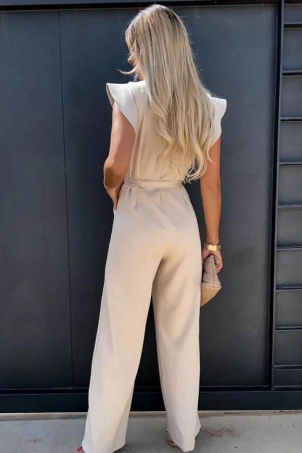 Women's elegant open-back jumpsuit for a sophisticated high-waist look, perfect for a chic party or stylish spring event.