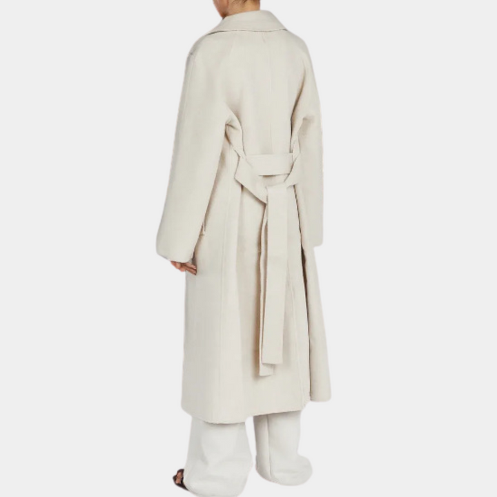 Classic women's long oversized trench coat with adjustable belt, sophisticated and versatile for any look.