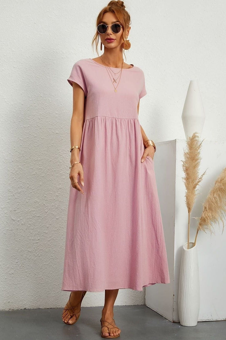 Comfortable women's elegant midi dress with beautiful pleats. Versatile for any season, especially spring.