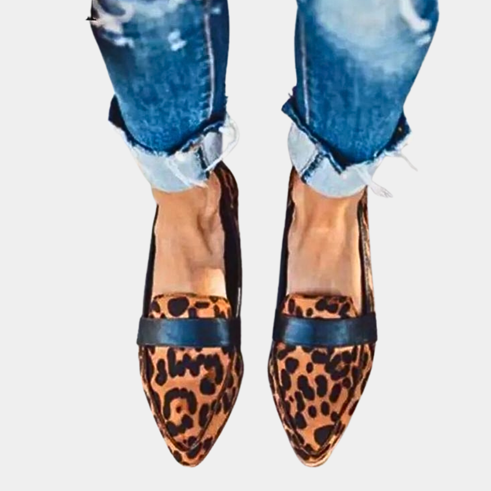 Comfortable women's pointed-toe slip-on flats, ideal for all-day wear & elegant office fashion.