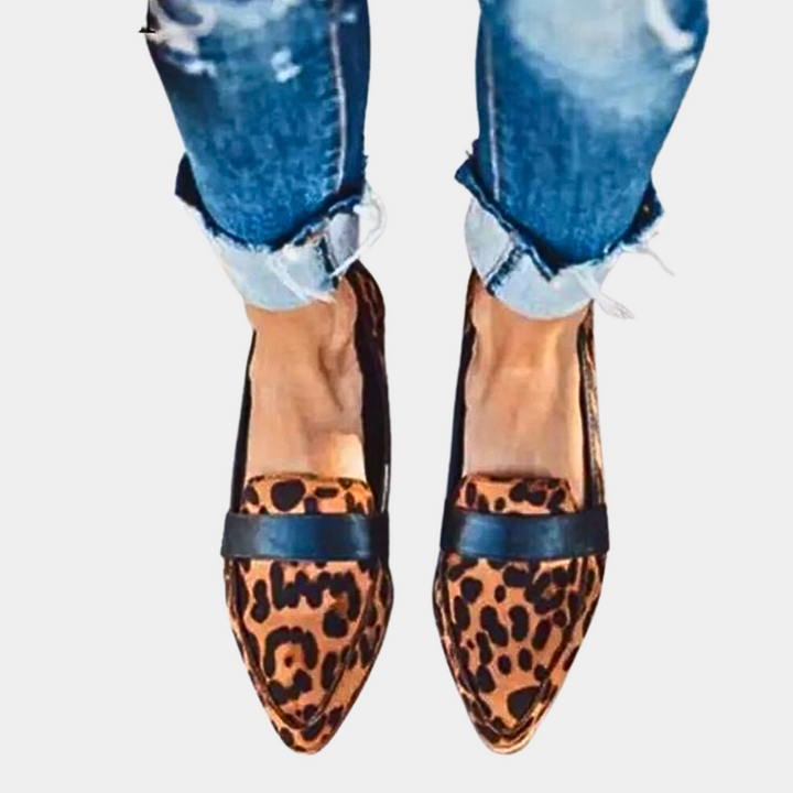 Comfortable women's pointed-toe slip-on flats, ideal for all-day wear & elegant office fashion.