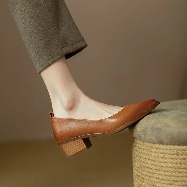 Versatile women's slip-on pointed toe court shoes. Mid block heel, ideal for professional & smart casual.