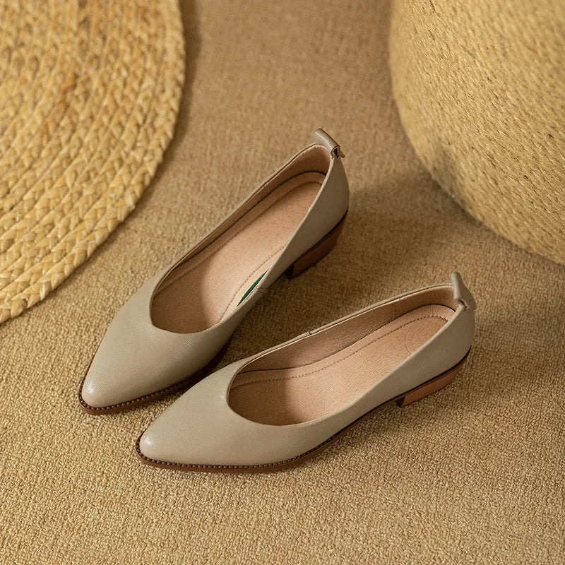 Comfortable & elegant women's slip-on pointed toe heels. Chic mid block heel for professional attire.