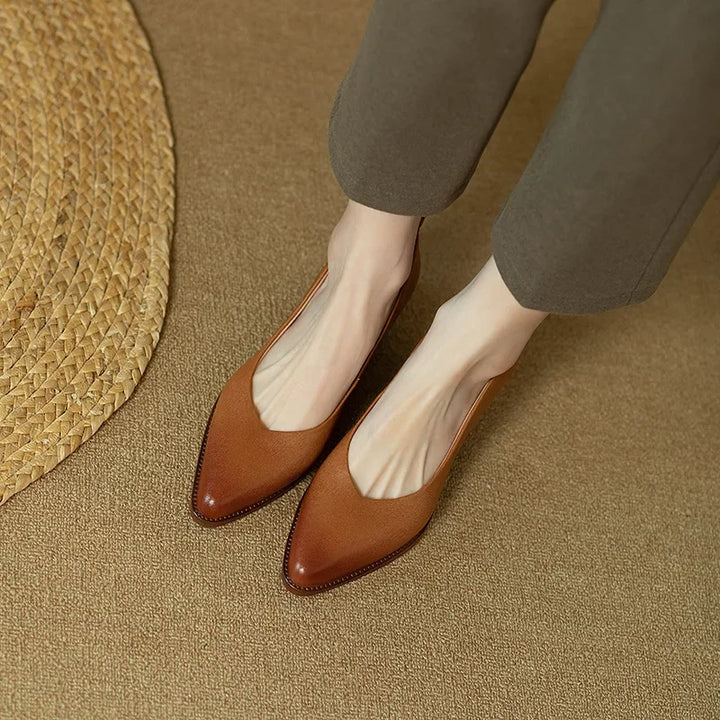 Front view: Women's brown elegant slip-on court shoes. Stylish pointed toe & mid block heel.
