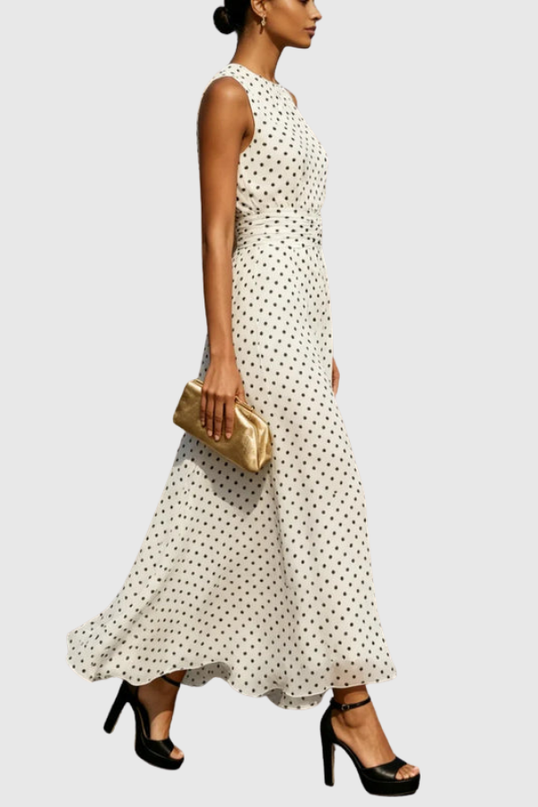 Chic sleeveless polka dot halter maxi dress for women featuring a keyhole neckline and flowy A-line ruffle hem.