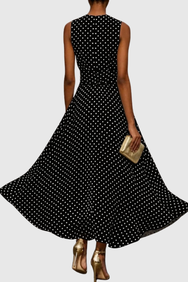 Comfortable women's polka dot halter maxi dress with keyhole detail and A-line cut, great for warm weather.